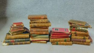 A collection of antique leather bound books, some with hand marbling, to include the collection of