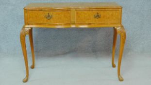 A mid century burr walnut Georgian style serving table with fitted canteen drawers containing a