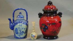 A collection of ceramics and glass. Including a West German glazed ceramic lidded Rumtopf jar with