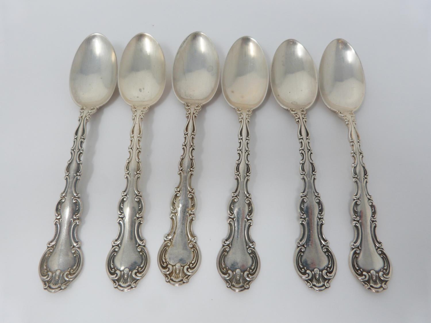 A collection of ten silver tea spoons. A set of four Norwegian gilded pink guilloche enamel coffee - Image 11 of 15