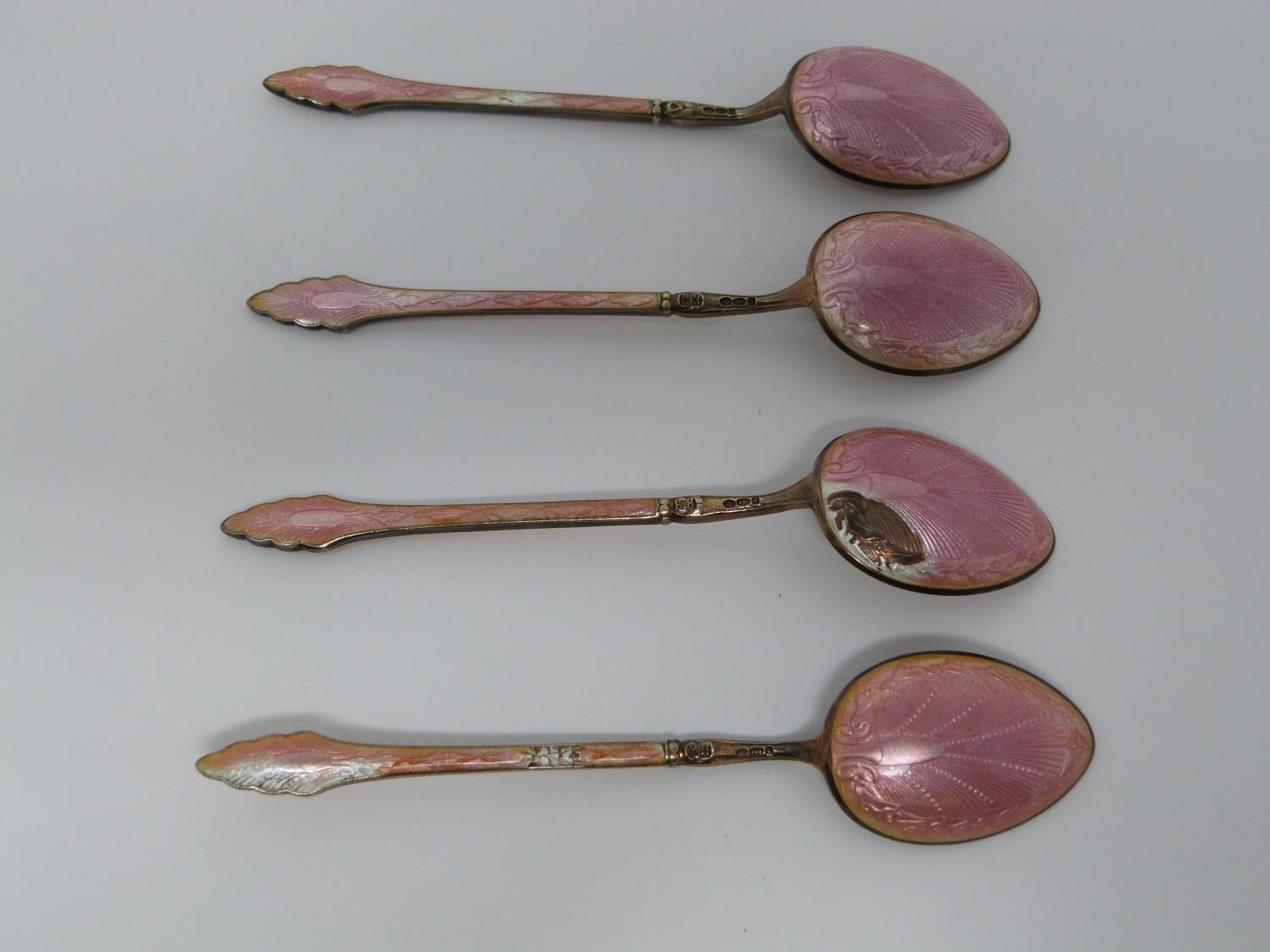 A collection of ten silver tea spoons. A set of four Norwegian gilded pink guilloche enamel coffee - Image 3 of 15