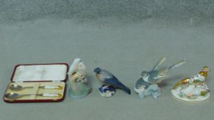 A miscellaneous collection of four porcelain birds to include Lladro and Royal Copenhagen, a Crown