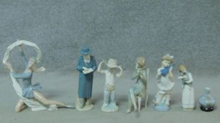 A miscellaneous collection of six Lladro and NAO figures and a similar vase. The vase painted to