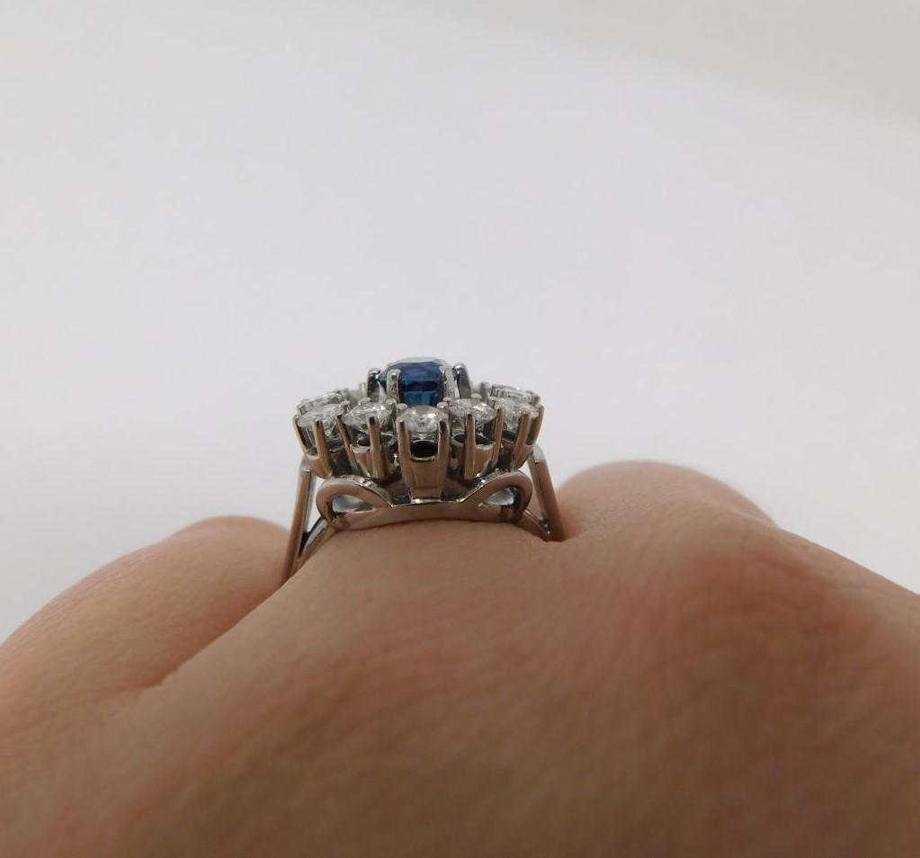 A vintage 14 carat white gold sapphire and diamond cluster ring. Set to center with an oval mixed - Image 10 of 11