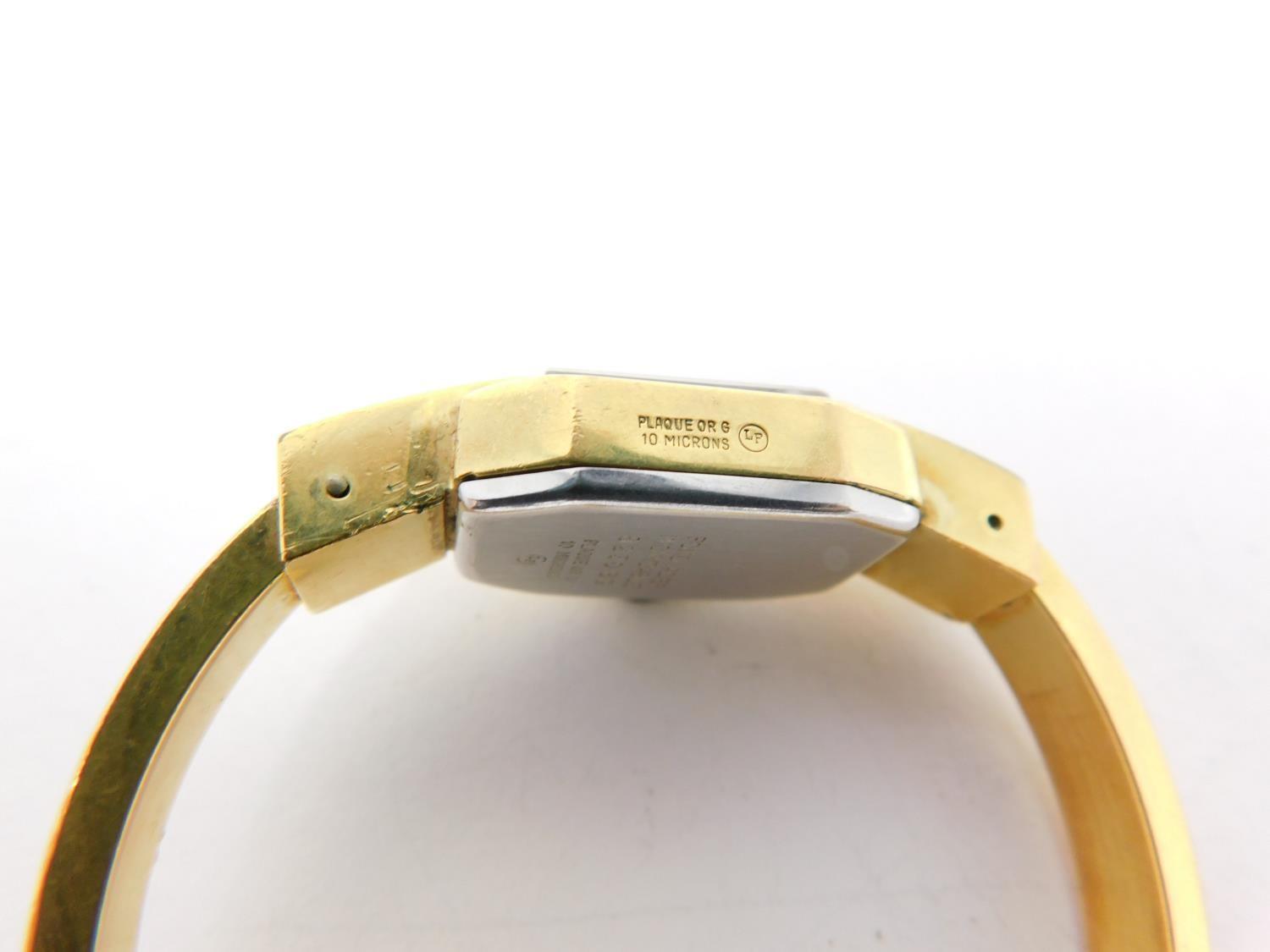 A gold plated vintage Arugo Swiss made ladies bangle watch. Diameter 4.8cm. - Image 3 of 7