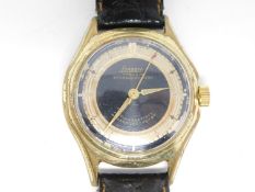 A vintage gold plated German Foresta watch, 17 Rubis, with gilded dial and hands, on a brown leather
