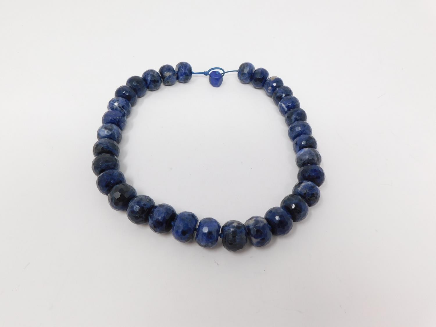 A honeycomb faceted Sodalite bead nacklace with Lapis Lazuli silk chord loop clasp. Comprised of - Image 8 of 10