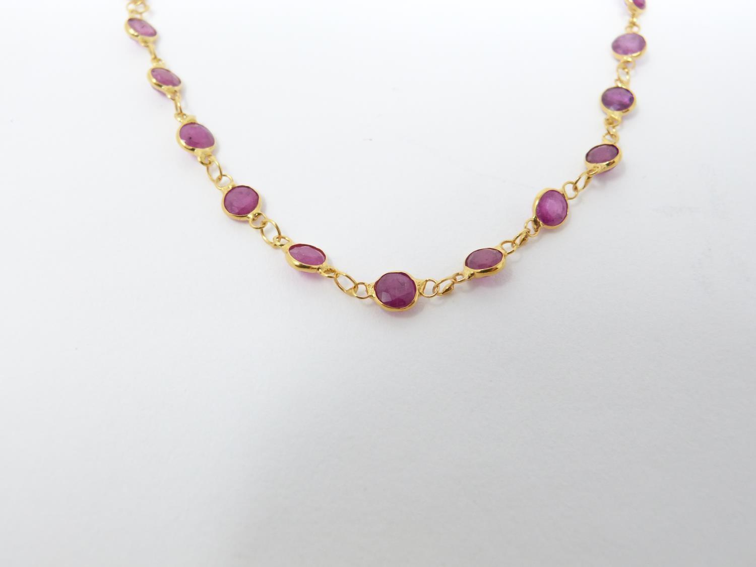 A bespoke yellow metal (tested 14 carat yellow gold) and ruby chain necklace. Set with fifty one - Image 6 of 6