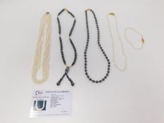 A collection of hematite and cultured pearl jewellery. Including two Hematite necklaces, one