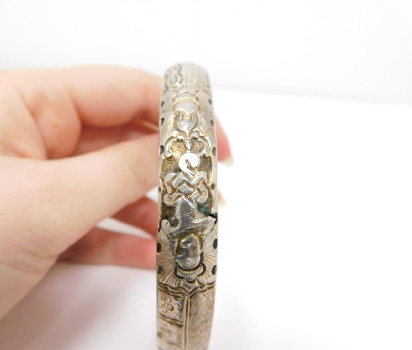 An antique Chinese engraved white metal bangle and toggle buttons. The bangle is engraved with a - Image 7 of 14