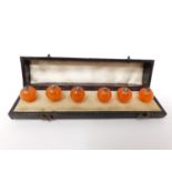 a cased set of antique carnelian waistcoat buttons. L12cm