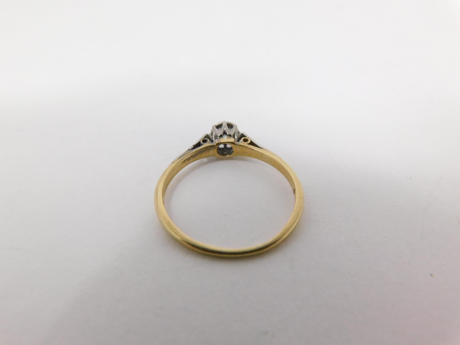 A 18 carat yellow gold and platinum flanked solitaire ring. Set to centre with a round brilliant cut - Image 3 of 8