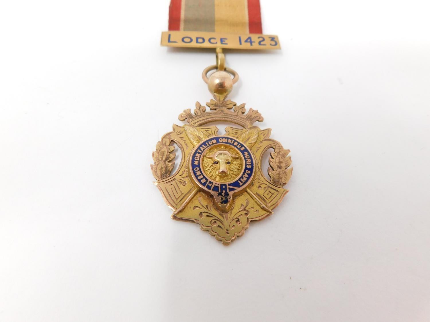 A 9 ct rose gold and enamel engraved Masonic lodge 1423 medal on an embroidered silk ribbon. - Image 2 of 8