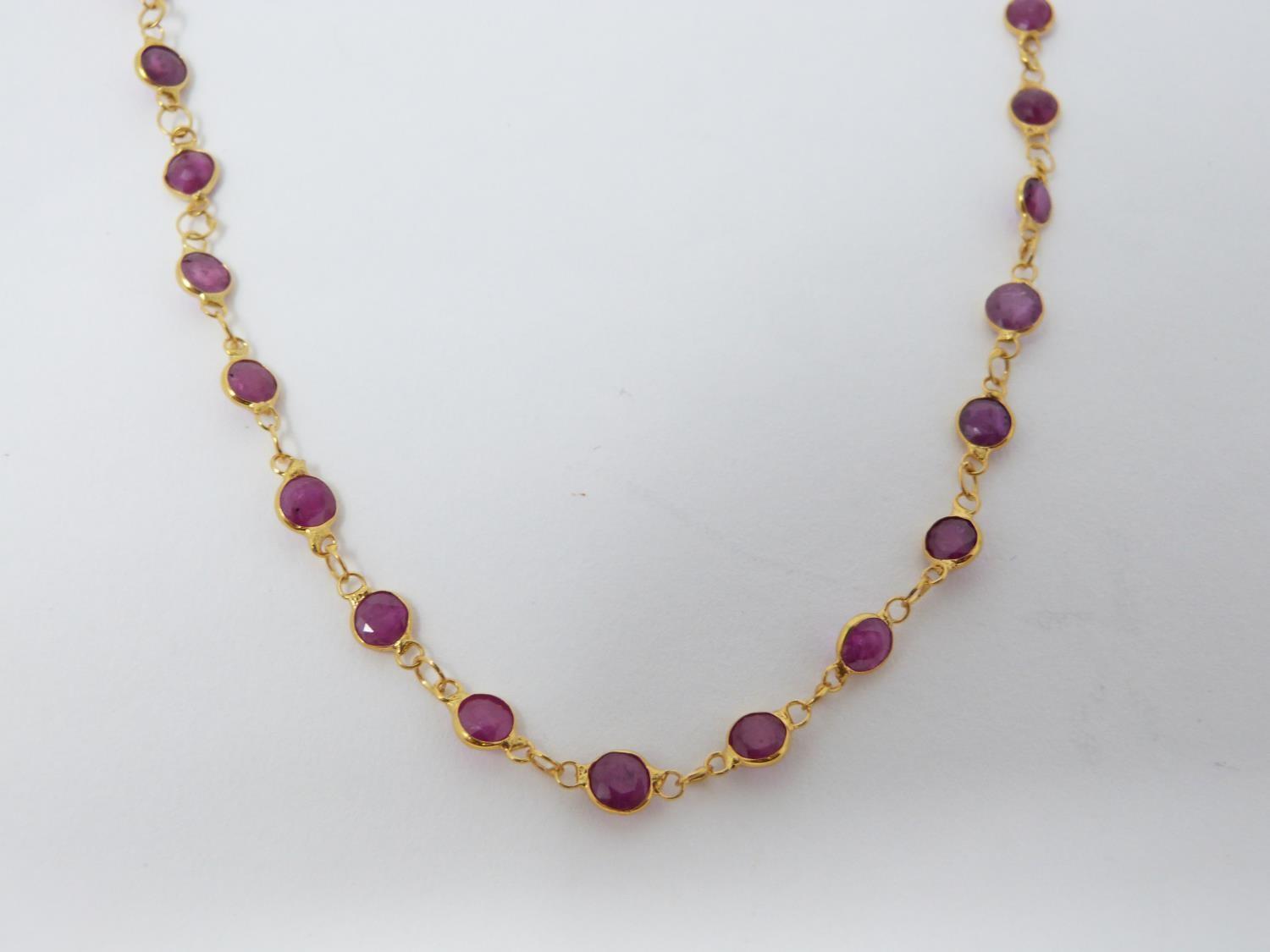 A bespoke yellow metal (tested 14 carat yellow gold) and ruby chain necklace. Set with fifty one - Image 4 of 6