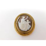 A Victorian reversible pinch beck cameo mourning brooch. One side has a carved shell cameo and the
