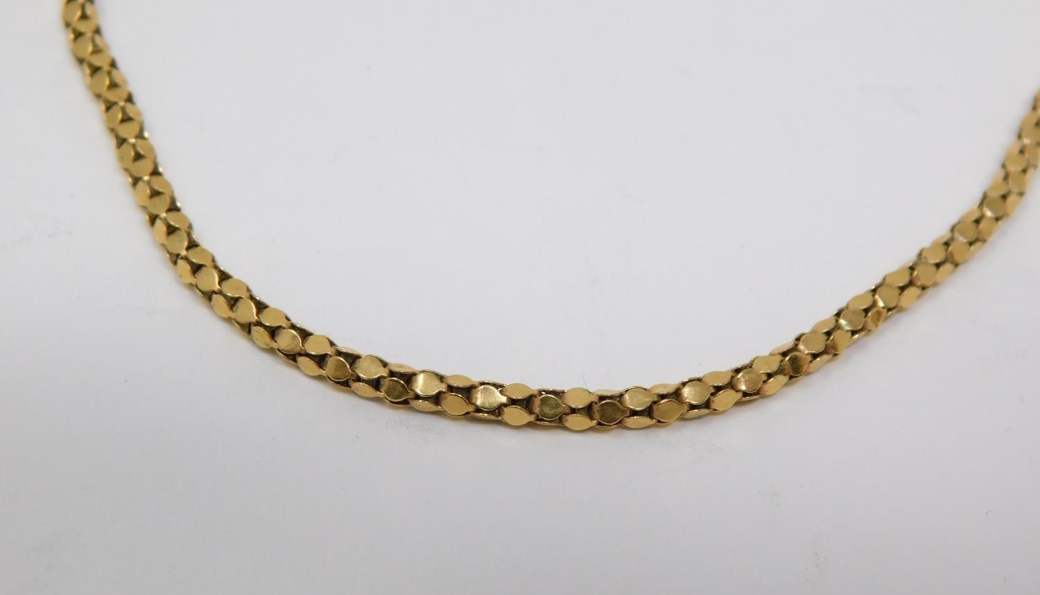 An 18 carat yellow gold fancy link rope chain. Hallmarked 750 with a secure C clasp. Length 50cm, - Image 3 of 7