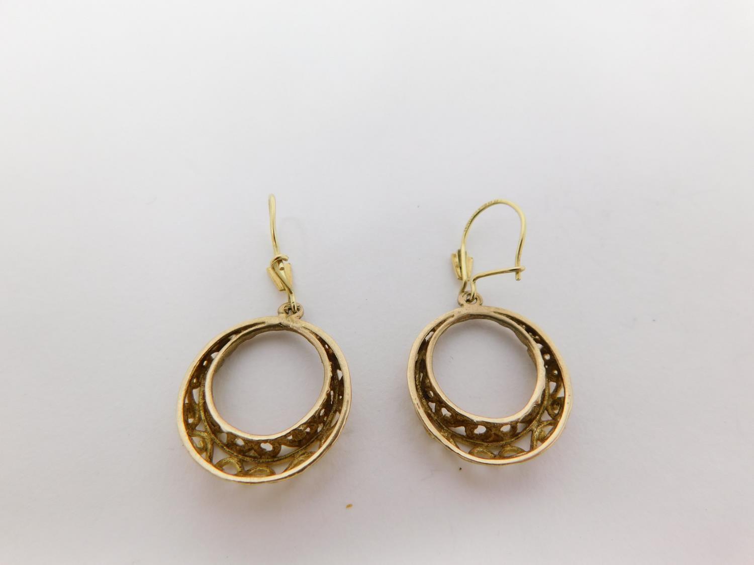 Four pairs of gold earrings. Including a pair of 18 carat gold textured gem set earrings, a pair - Image 4 of 13