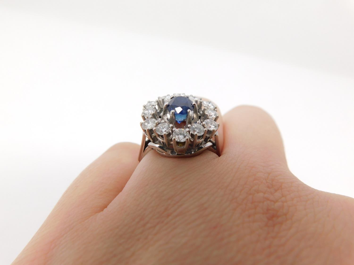 A vintage 14 carat white gold sapphire and diamond cluster ring. Set to center with an oval mixed - Image 11 of 11