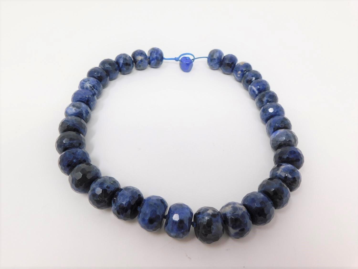 A honeycomb faceted Sodalite bead nacklace with Lapis Lazuli silk chord loop clasp. Comprised of - Image 7 of 10