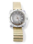 A vintage men's Timex Water Resistant Automatic watch on a gold tone stretch strap. Base metal