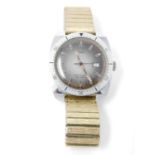 A vintage men's Timex Water Resistant Automatic watch on a gold tone stretch strap. Base metal