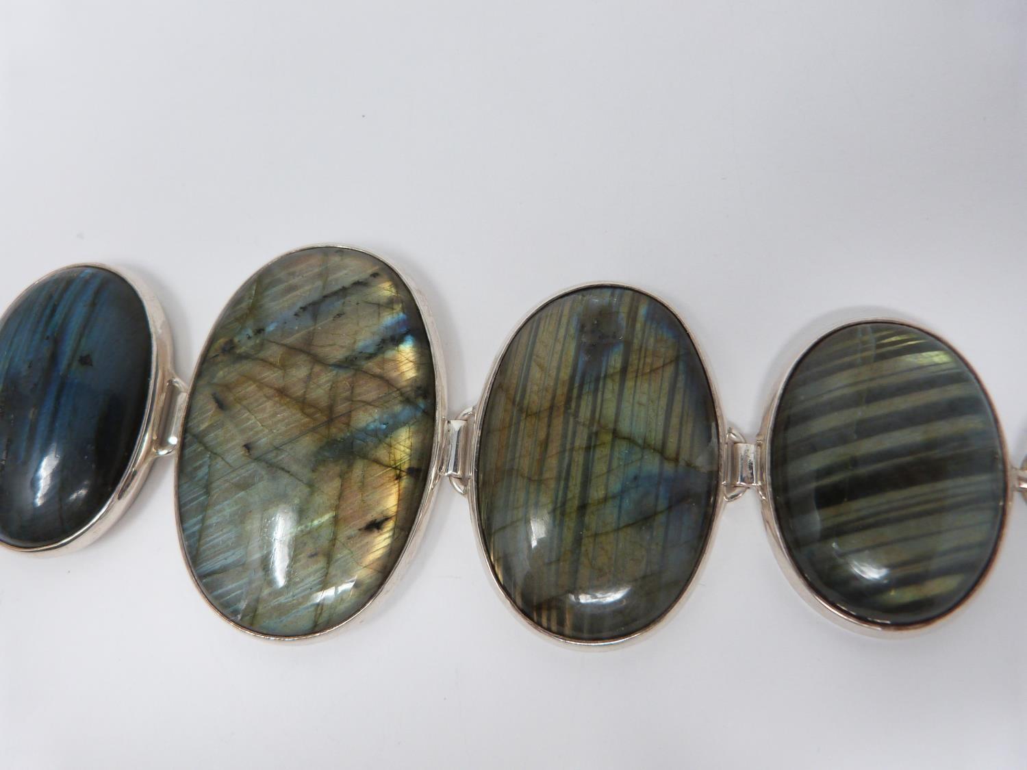 A bespoke silver and Labradorite articulated bracelet, set with five Labradorite cabochons, - Image 10 of 10