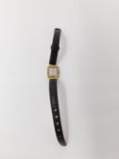 An 18 carat yellow gold cased Art Deco Allaine ladies watch. Swiss made, with square face, case