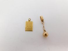 A 18 carat gold ball and chain pendant along with a 9 ct gold rectangular St. Christopher. Both