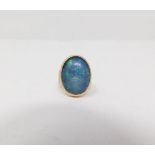 A vintage black opal triplet 9ct gold gentlemans ring. Set with an oval black opal triplet with a