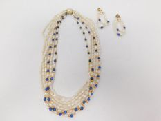 A vintage six stranded cultured pearl and lapis lazuli necklace and matching clip earrings. The