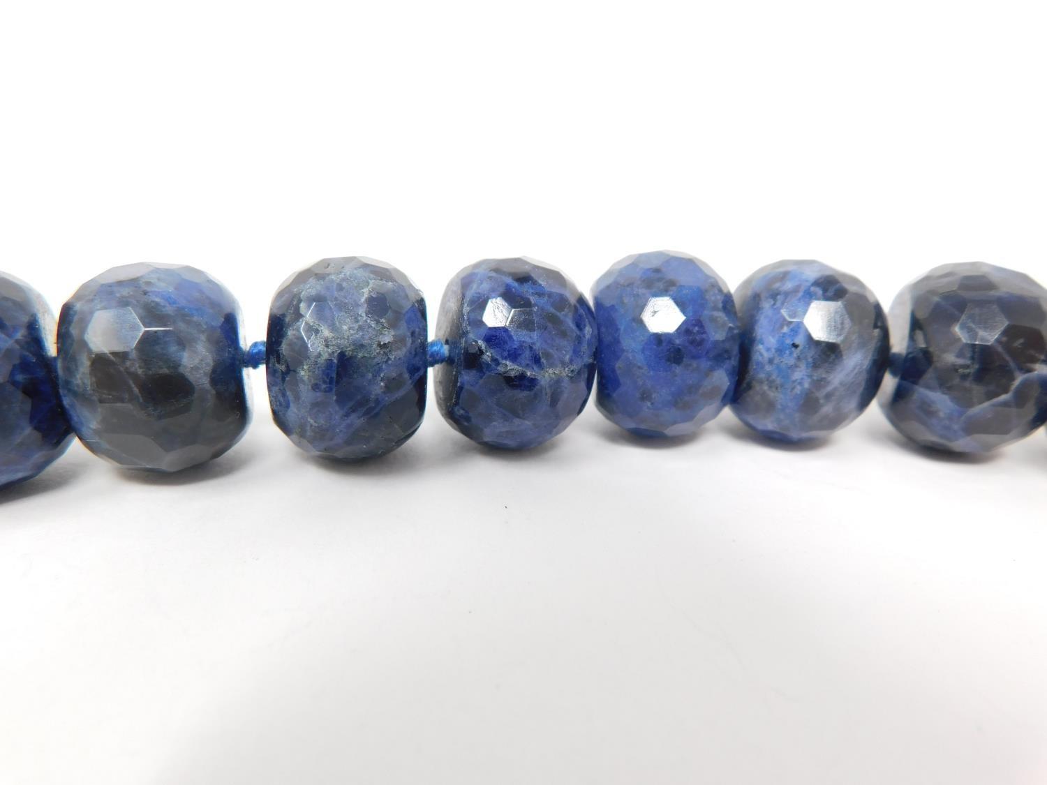 A honeycomb faceted Sodalite bead nacklace with Lapis Lazuli silk chord loop clasp. Comprised of - Image 5 of 10