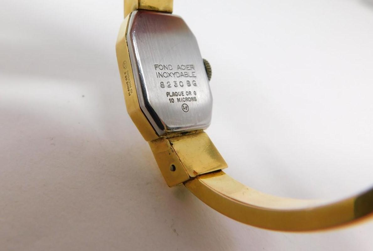 A gold plated vintage Arugo Swiss made ladies bangle watch. Diameter 4.8cm. - Image 5 of 7