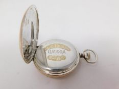 A vintage omega silver pocket watch. The case is silver and there are continental hallmarks inside