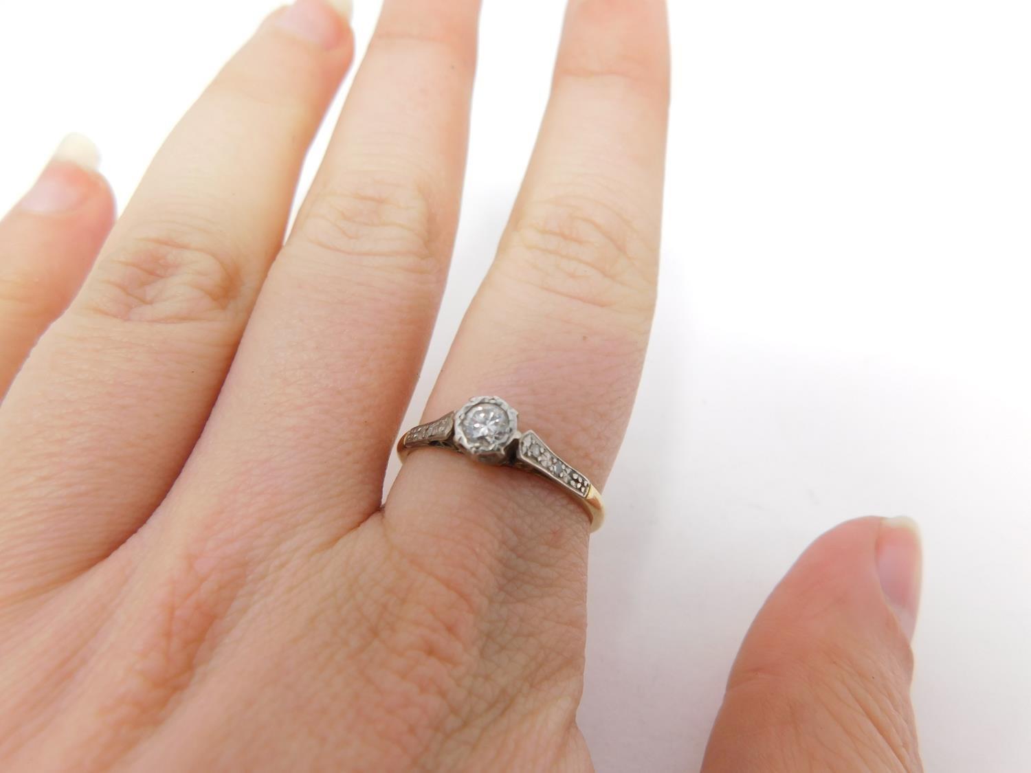 A 18 carat yellow gold and platinum flanked solitaire ring. Set to centre with a round brilliant cut - Image 7 of 8