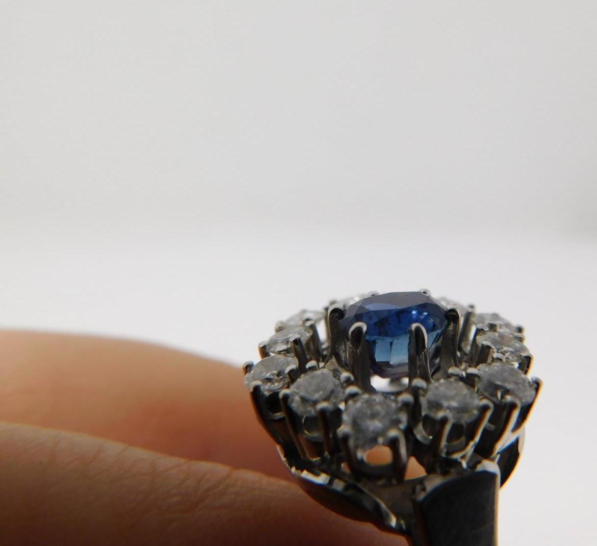 A vintage 14 carat white gold sapphire and diamond cluster ring. Set to center with an oval mixed - Image 6 of 11