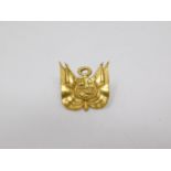 A yellow metal plated Peruvian military insignia screw pin badge. Intricately detailed. Width 2 cm.