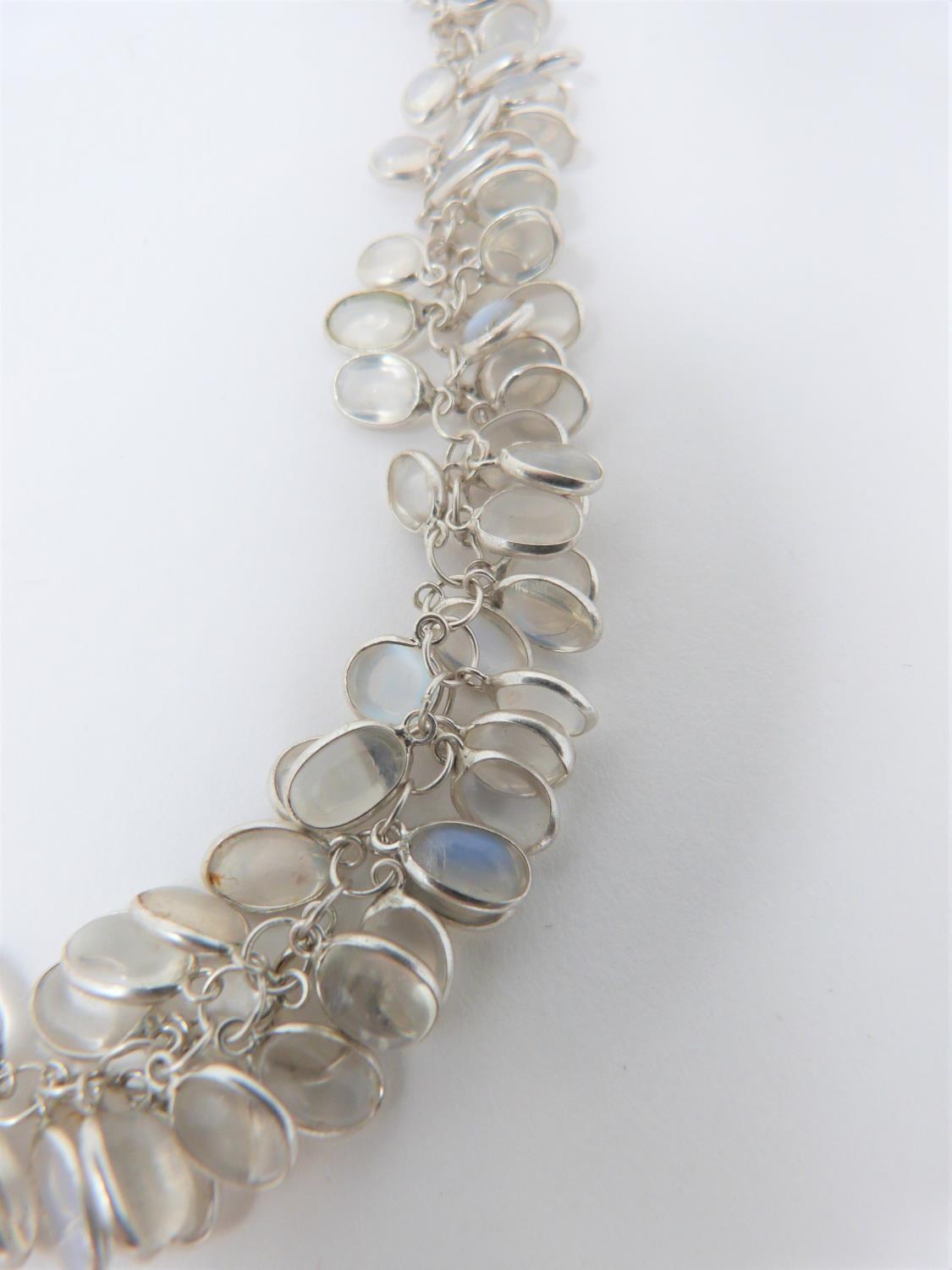 A bespoke Moonstone and silver graduated garland necklace. The oval moonstones set in individual - Image 5 of 7