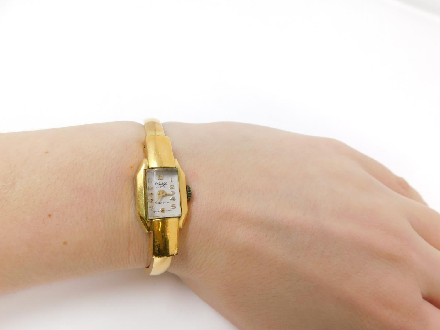 A gold plated vintage Arugo Swiss made ladies bangle watch. Diameter 4.8cm. - Image 7 of 7