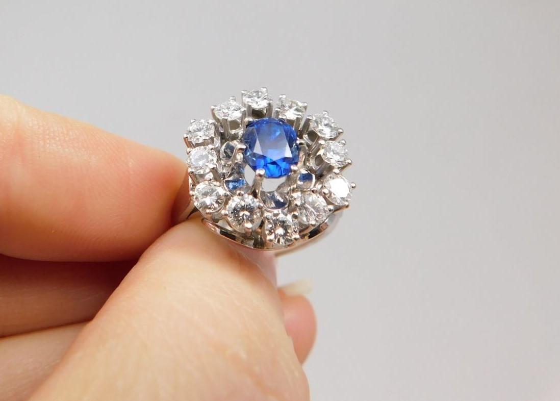 A vintage 14 carat white gold sapphire and diamond cluster ring. Set to center with an oval mixed - Image 4 of 11