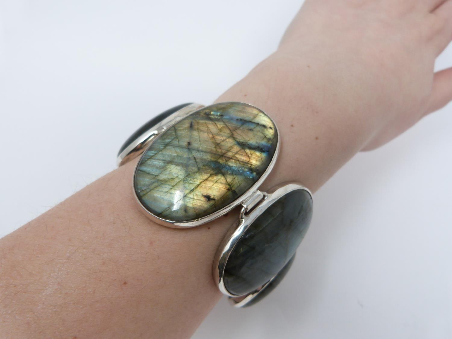 A bespoke silver and Labradorite articulated bracelet, set with five Labradorite cabochons, - Image 2 of 10