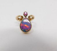 A Black Opal doublet Art Nouveau style ring, set with a drop shape Black Opal doublet and a