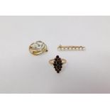 A 9 ct gold pearl bar brooch with a yellow metal garnet ring and a bi-colour 9ct gold pearl and