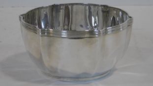 A Victorian fluted silver bowl with linear design to the rim. Hallmarked: WMBJS for Edward Barnard &