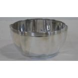 A Victorian fluted silver bowl with linear design to the rim. Hallmarked: WMBJS for Edward Barnard &