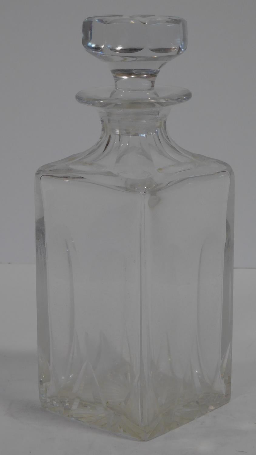 A Cartier French cut square crystal decanter with star cut design stopper. Signed to the base. H. - Image 2 of 6