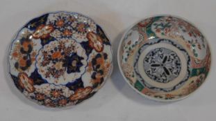 Two 19th century Japanese Arita Imari porcelain pieces. A bowl decorated with flowers, foliage,