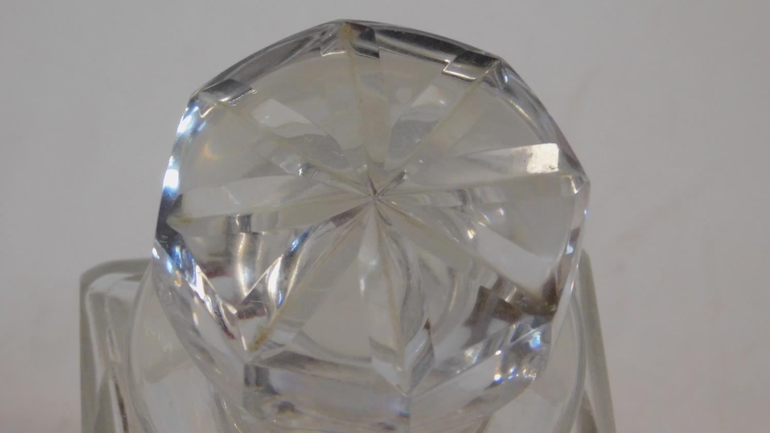 A Cartier French cut square crystal decanter with star cut design stopper. Signed to the base. H. - Image 3 of 6