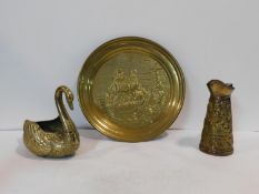 A collection of vintage brass items, embossed jug, tray and a swan figure, H.23cm