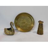 A collection of vintage brass items, embossed jug, tray and a swan figure, H.23cm