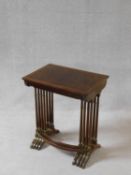 A set of four Regency style burr walnut and crossbanded graduating occasional tables on ring